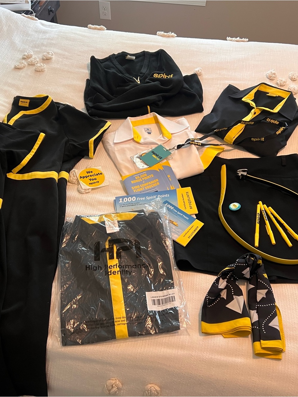 Spirit A Airlines uniform pieces and miscellaneous